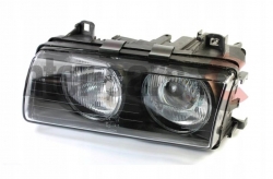 Priekšējais lukturis ar lēcu no BMW 3-serijas E36 (1991-1994), laba pusē ― AUTOERA.LV